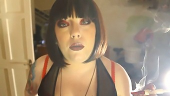 Fat Submissive Smokes A Filterless Cigarette In A Holder